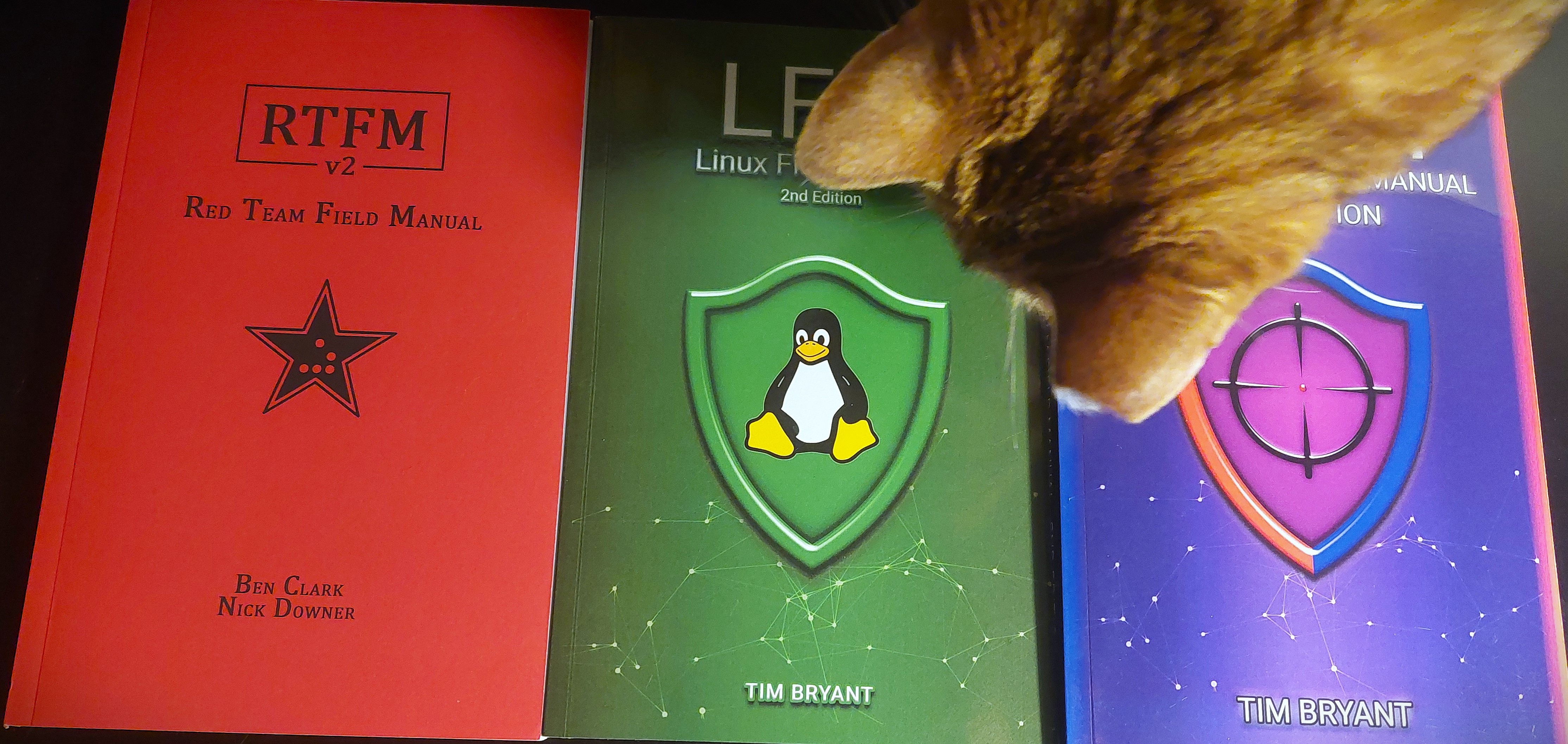 Red Team Field Manual V2 by B. Clark and N. Downer, Linux Field Manual by T. Bryant, and Purple Team Manual by T. Bryant